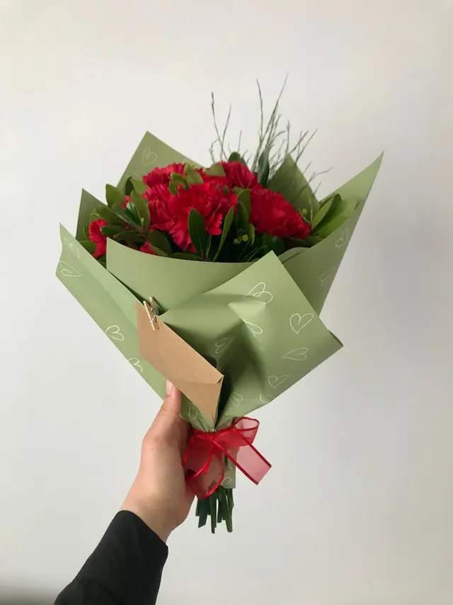 Elegant Bouquet of Red Flowers with Green Wrapping